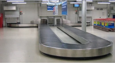 Sistema di nastri trasportatori per bagagli aeroportuali